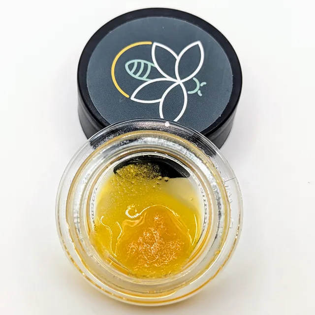 Cherry Bang Bang Fire Bug live resin sugar sauce in a glass jar